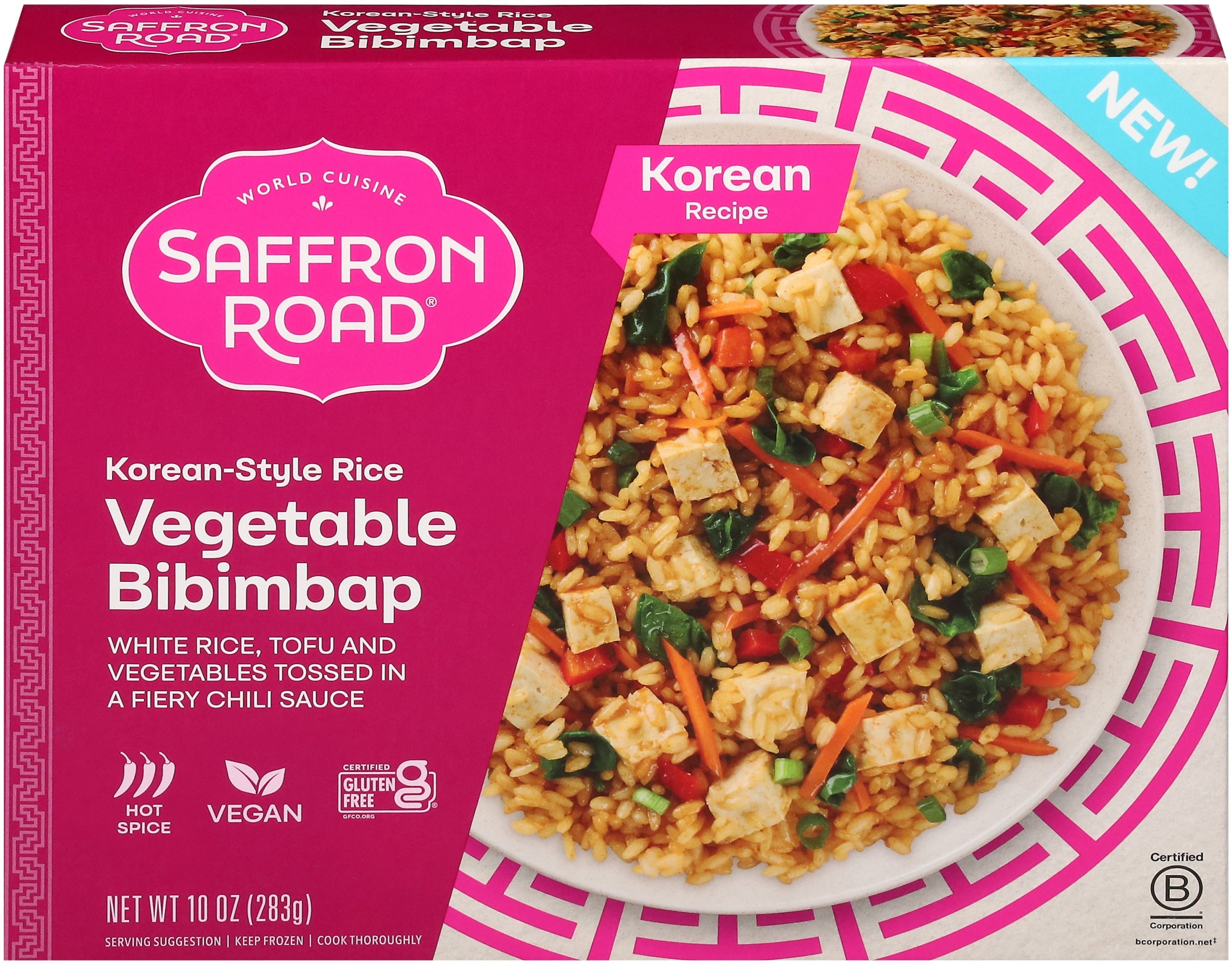 Front of Saffron Road Korean-Style Rice Vegetable Bibimbap package. Korean recipe with white rice, tofu, and vegetables in a chili sauce. Hot spice, vegan, gluten-free.